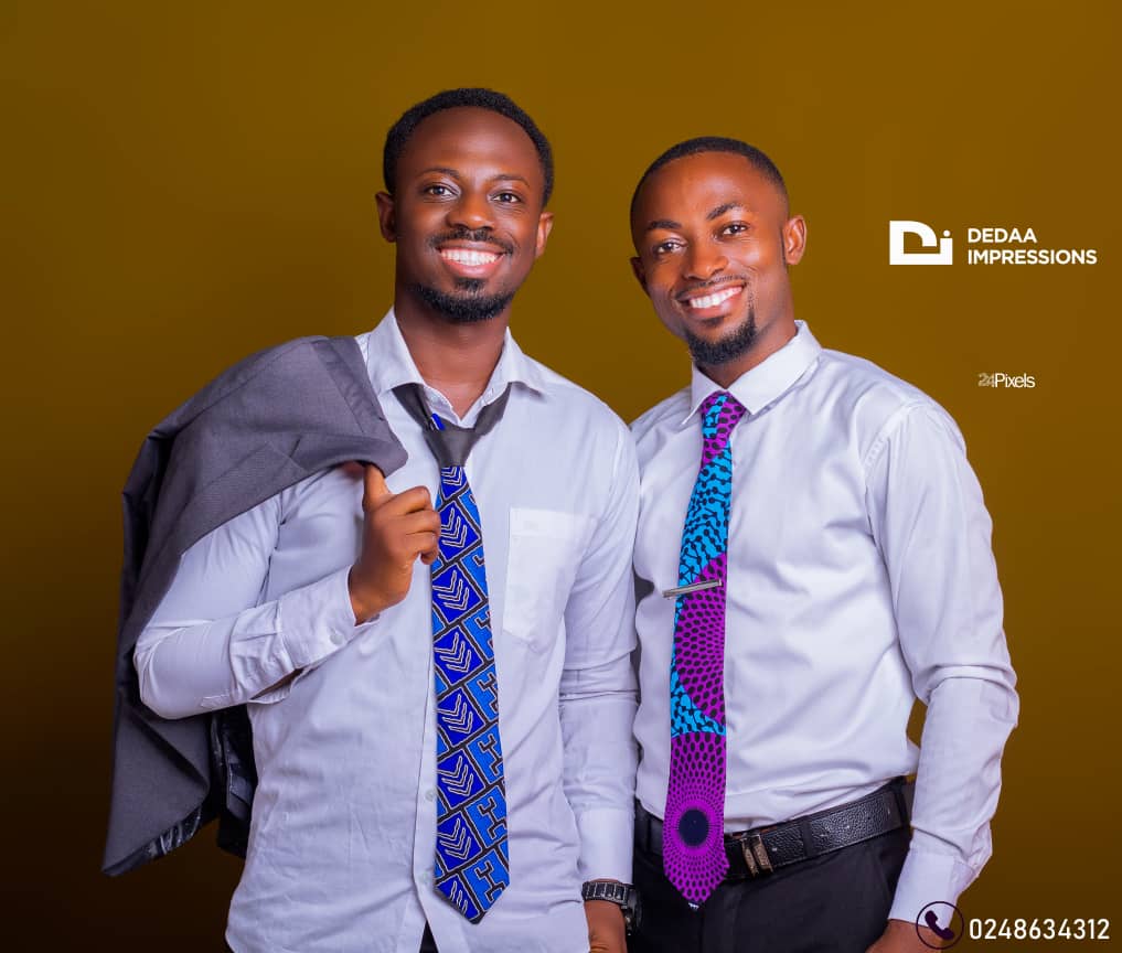 two men in an african fabric tie